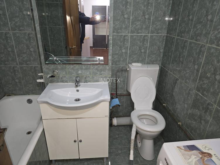 Garsoniera moderna transformata in doua camere in Gavana / Lumina - 9