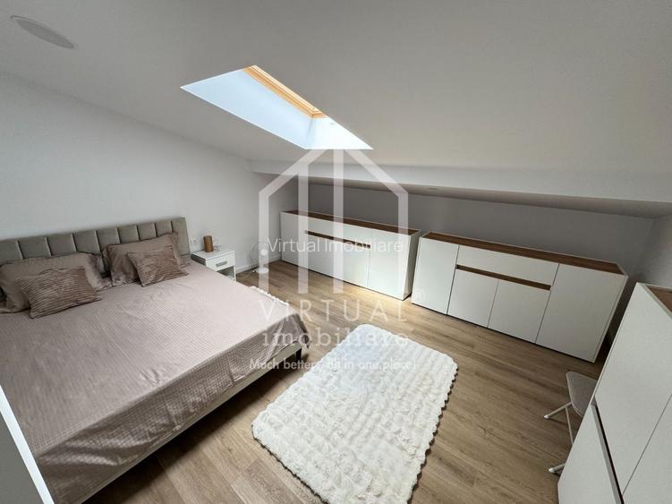 Penthouse mobilat si utilat modern - 89 mp, loc de parcare - 9