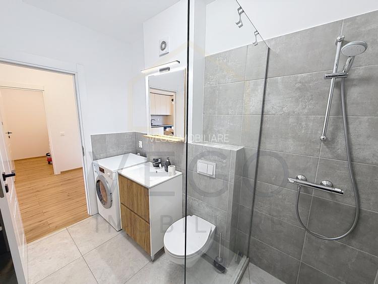 Apartament nou 2 camere, terasa 47 mp, garaj, Beta Residence Chinteni - 11