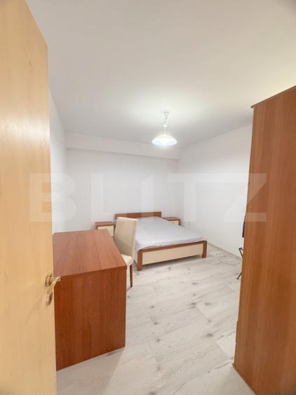 Cladire multifunctionala, pensiune plus casa, parcari private