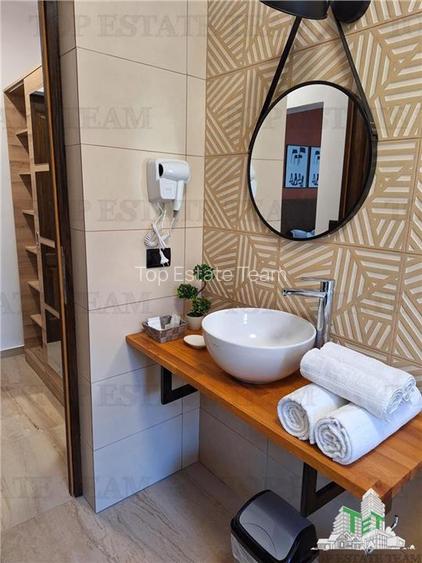 Pensiune premium de vanzare in Voronet - 1.610 mp utili, teren 1.021 mp, afacere - 6