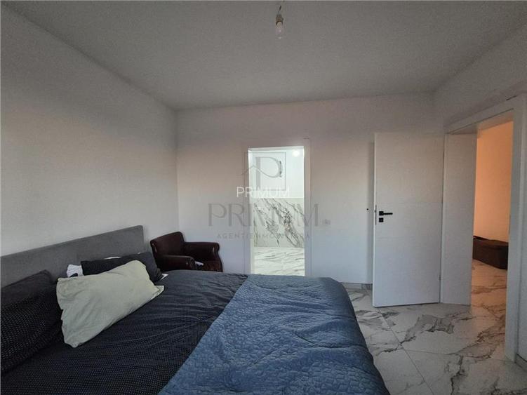 Casa individuala - parter - 3 dormitoare - finalizata - teren foarte mare - 12