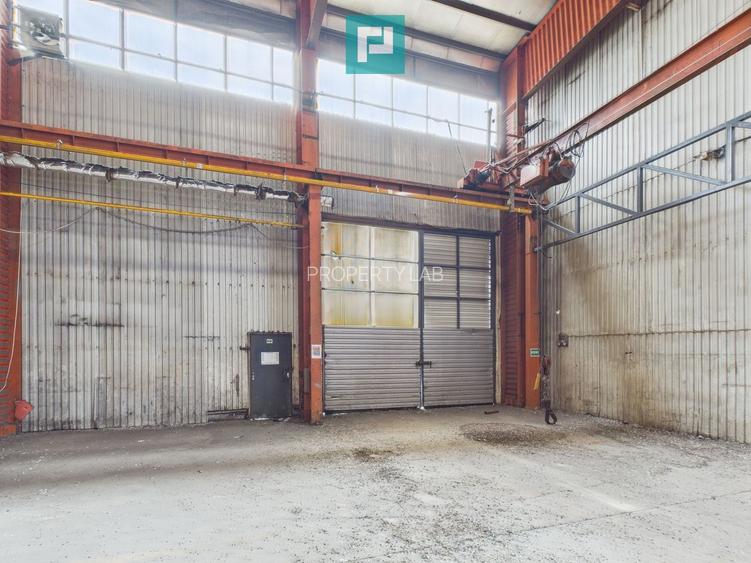 Hală industrială cu pod rulant și parcare betonată - 9