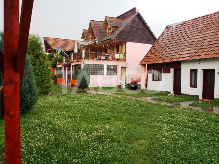 Pensiune la cheie 13 camere  15 locuri parcare si teren 3000 mp - 3