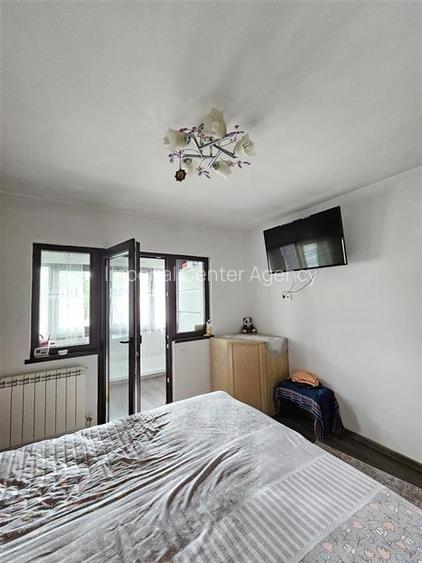 IN EXVLUSIVITATE APARTAMENT 2 CAMERE PARTER DE VANZARE IN ONESTI - 4