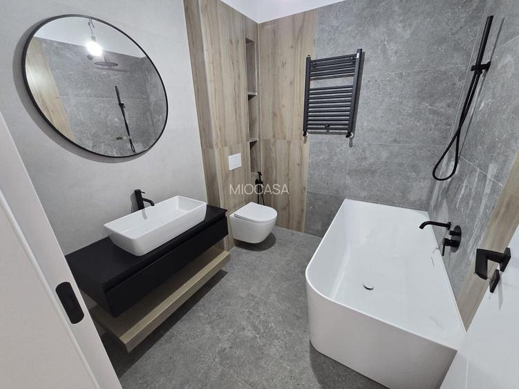 Apartament superb pe 2 niveluri. Bucatarie inchisa. 2 Locuri de Parcare. - 15