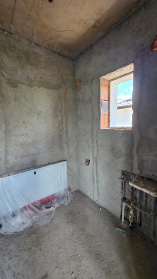 Casa parter 4camere,încălzire pardoseala,teren 300mp,pod cu placa de beton