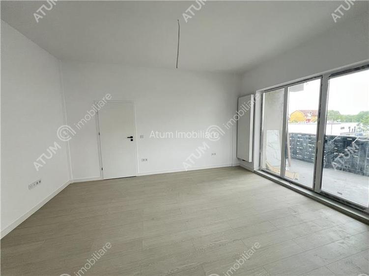 Apartament de 3 camere cu 2 bai etaj intermediar zona Rahovei - 2