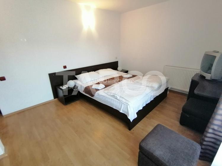 Pensiune 13 camere 16 bai sauna piscina si teren 1565 mp Cisnadioara - 15