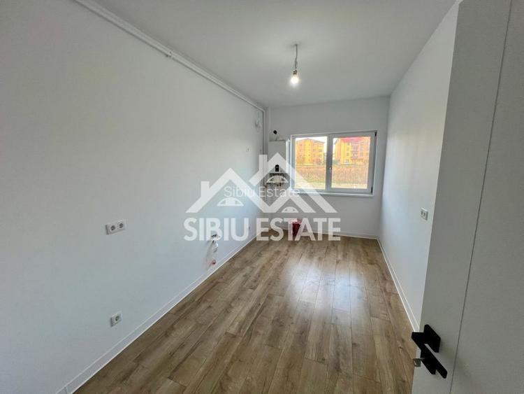 Apartament cu 3 camere, 2 bai, boxa 20 mp. loc de parcare -Finisat la cheie - 3
