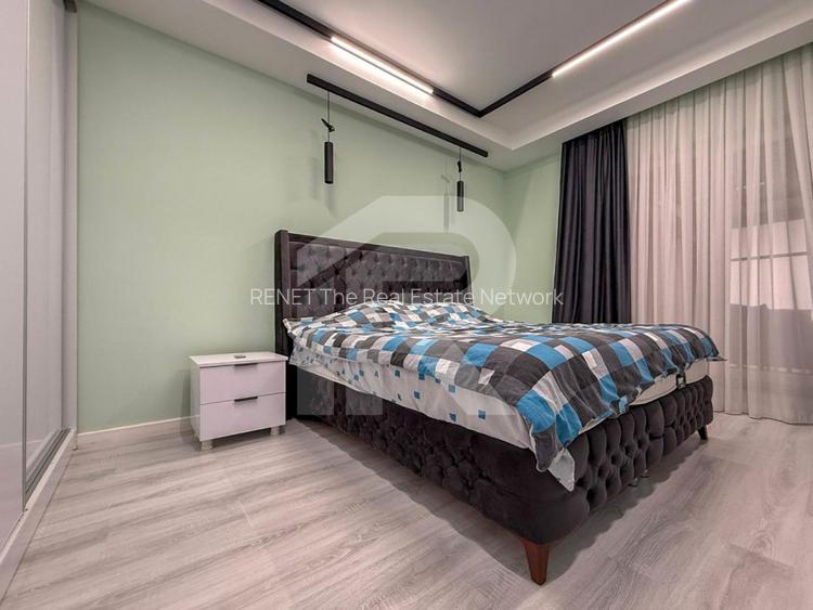 Apartament nou cu grădină 50mp, piscină și 3 locuri parcare incluse - 8