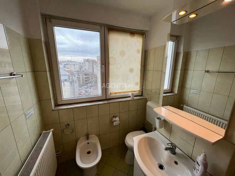 Cismigiu, 2 dormitoare cu hol locuibil, 2 balc, centrala proprie, bloc solid - 13