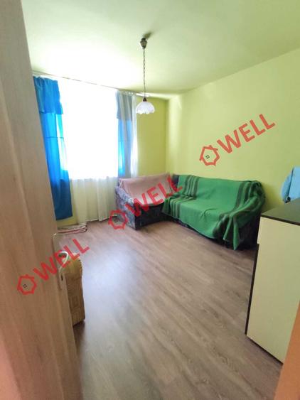 Apartament cu 2 camere de vânzare în centrul localității Brețcu!