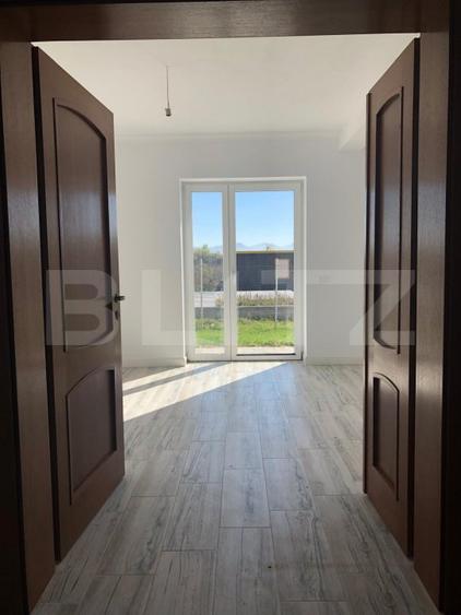 Casă individuală de vânzare în Sânpetru – 3 dormitoare, curte 500mp