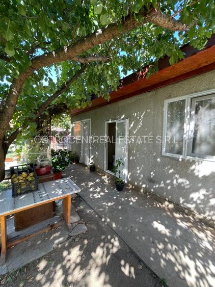 Refugiul Tău Verde: Casă Spațioasă cu Livadă, Anexe și Panouri Solare - 5