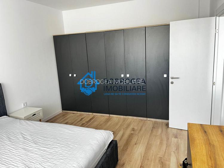 BLOC NOU -APARTAMENT CU 2  CAMERE,TREASA, LOC PARCARE ,TOTUL NOU - 9