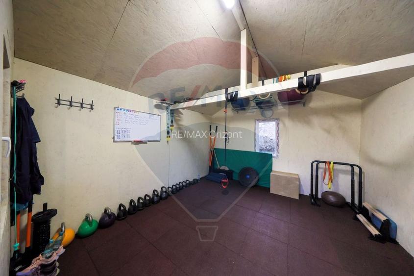 Ansamblu rezidențial cu casă principală și anexe, teren 1.487 mp - 18