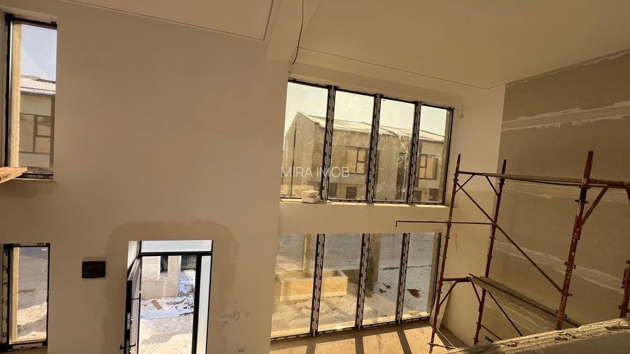 Casă individuală spațioasă, 120 mp utili, living pe două nivele, teren 365 mp - 9