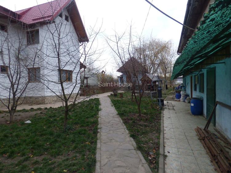 Vila cu 6 camere + 2 case + bazin inot+ 5.934 mp teren  com. Chichis - 22