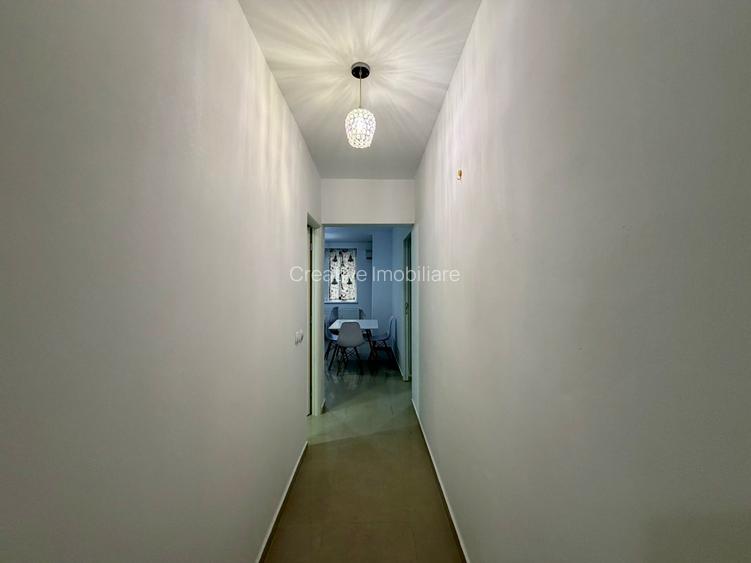 Apartament  cu 2 camere decomandat, cu 2 băi și dressing, etaj 1 - Tătărași - 11