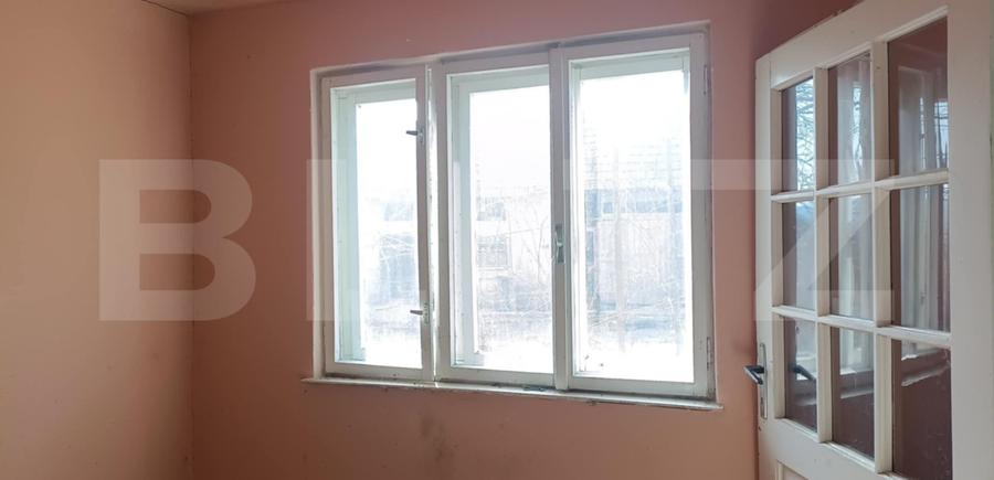 Casa cu 3 camere, bucatarie si baie, 105 mp și un teren de 1900 mp