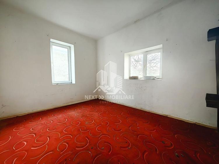 Teren intravilan 1052mp cu casa renovabila de cărămidă Tuzla