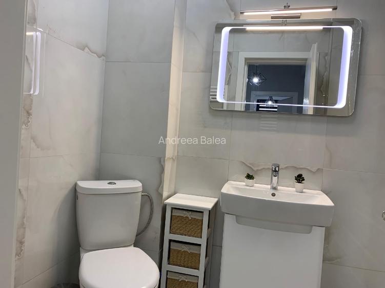 Ofer spre închiriere apartament  2 camere decomandat - 4