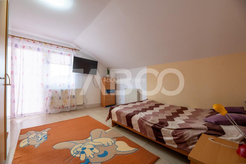 Casa de vanzare cu 4 dormitoare 2 bai si pivinita in Selimbar - 6