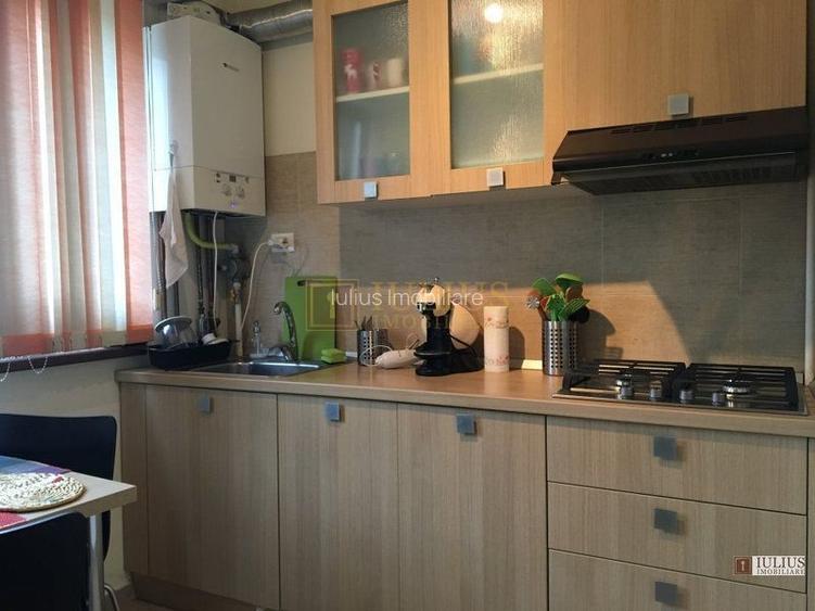 Centrala proprie, bucatarie inchisa si balcon spatios; posibilitate decontare - 9