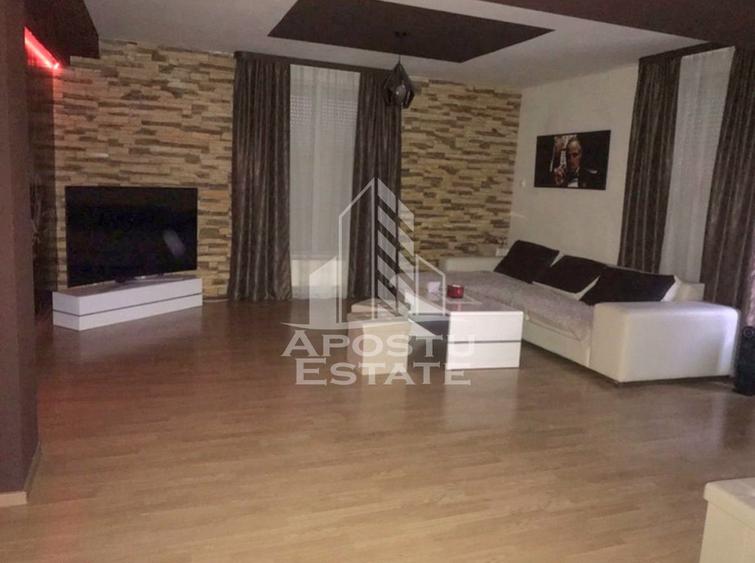 Casa individuala cu 7 camere si hala service,teren 600 mp,Dambovita