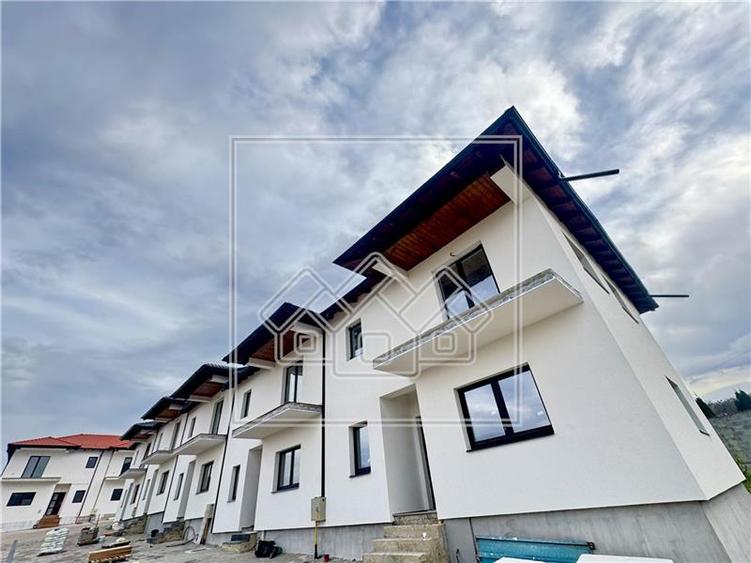 Casa 4 camere - imobil nou - zona exclusiv de case - Cisnadie