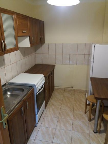 Inchiriez garsoniera la casa ,singur in curte mica