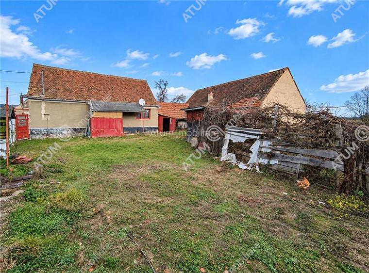 Casa cu 4 camere si 1650 mp teren la doar 30 km distanta de Sibiu - 4