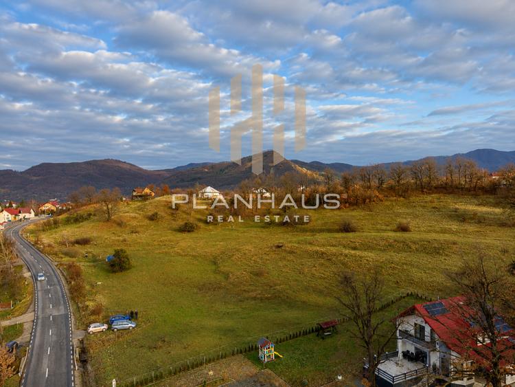 Teren Baia Sprie la soseaua principala ,langă pensiunea Madlene ,1 ha
