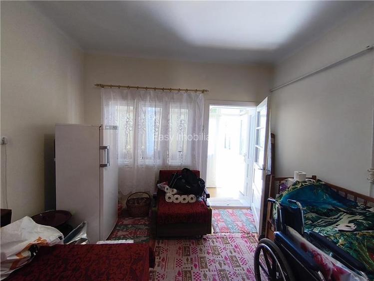 Casa pe un nivel renovata,curte individuala teren 780mp - 13