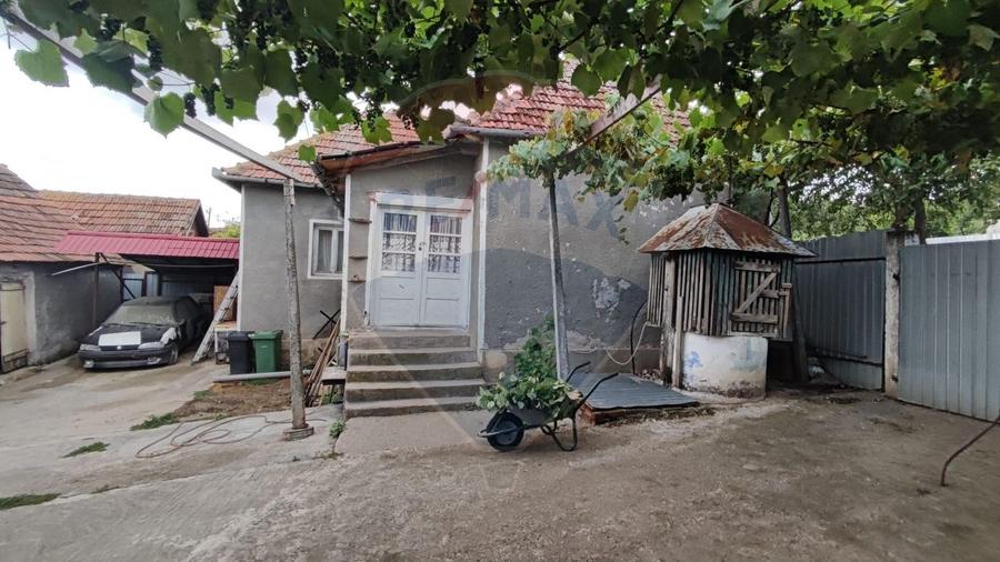 Casă cu 4 camere si teren de vânzare in com. Husasau de Tinca/Fonau