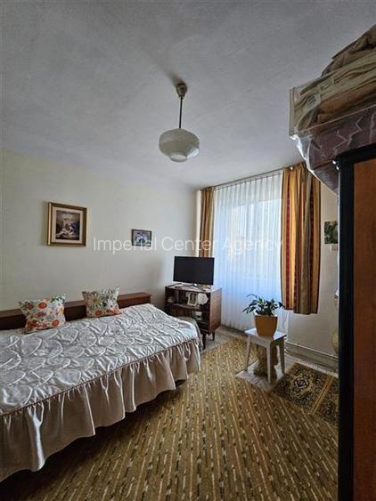 Apartament cu GRADINA SI ACOPERIS  MANSARDA DE VANZARE IN ONESTI ETJ 1 - 6