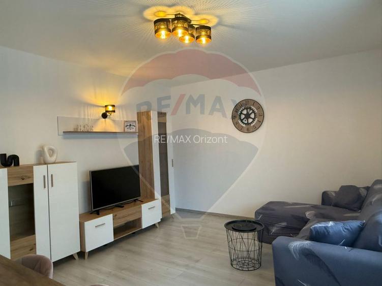 Apartament cu 3 camere, 2 bai și loc de parcare - 55