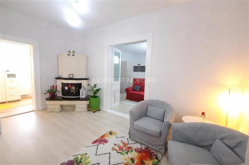 Casa situata central, cu un echilibru remarcabil intre traditie si design contem - 12