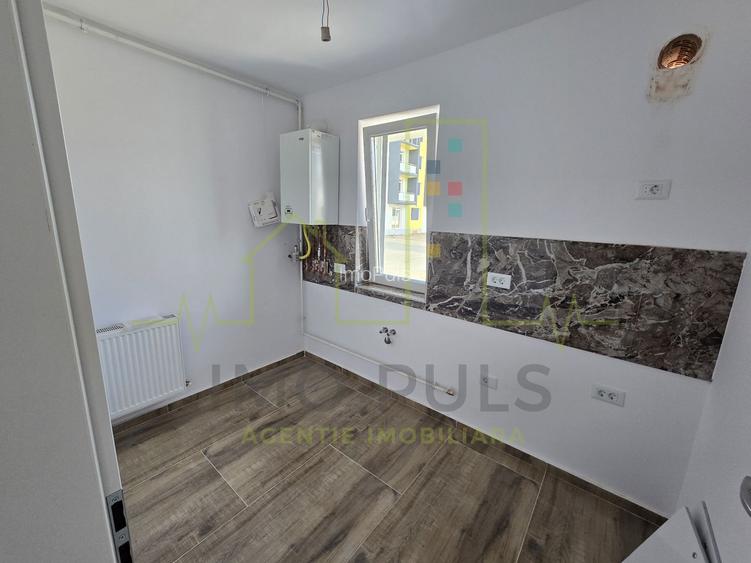 Apartament la parter cu balcon. Bucatarie separata. Loc de parcare - 2