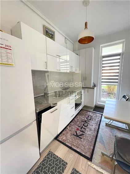 Garsoniera 29 mp decomandata cu gradina de 57 mp - 2