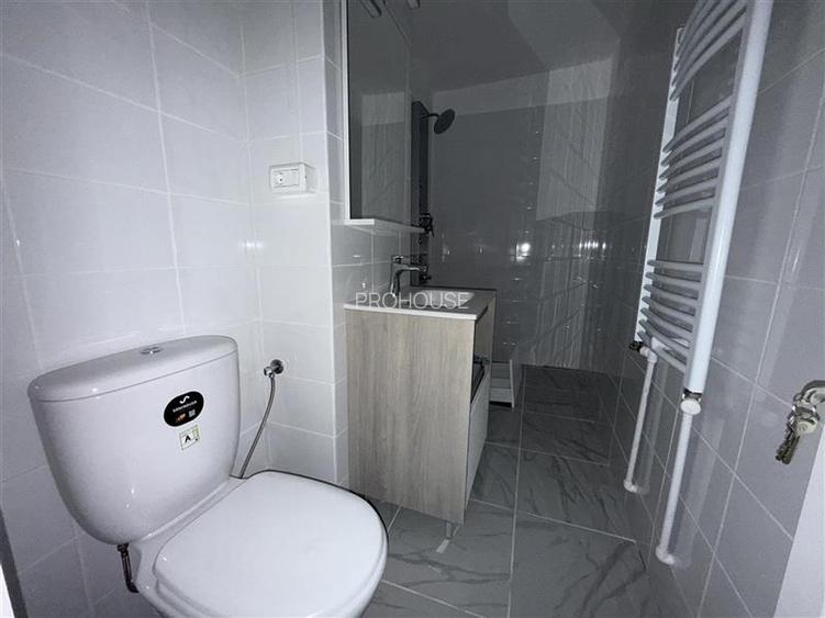 Adjud - spatiu comercial renovat complet - 20
