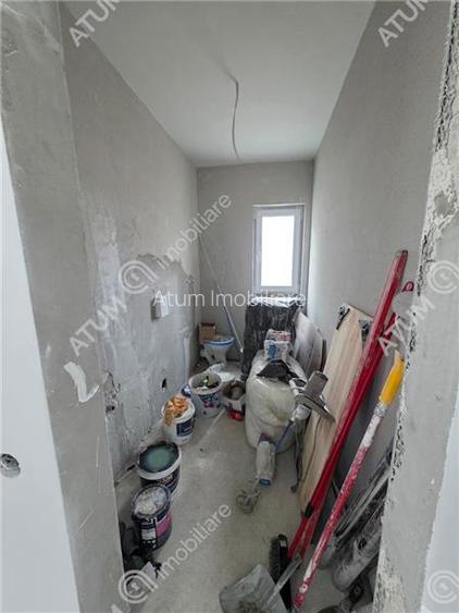 Casa individuala cu 4 camere si curte libera de 330 mp in Selimbar - 18