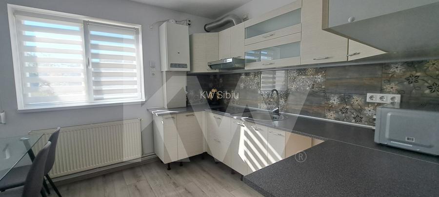 Apartament modern cu 2 camere, curte privată și 2 locuri de parcare
