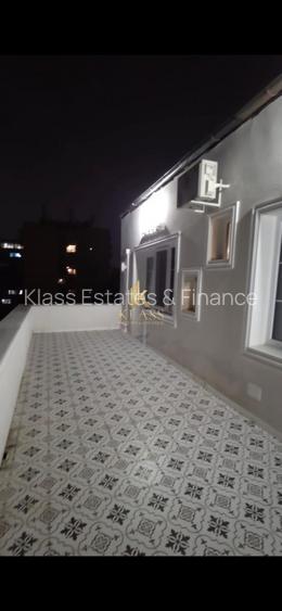 Apartament cu 2 camere - Bd. Dacia -P-ta  Romana - 13