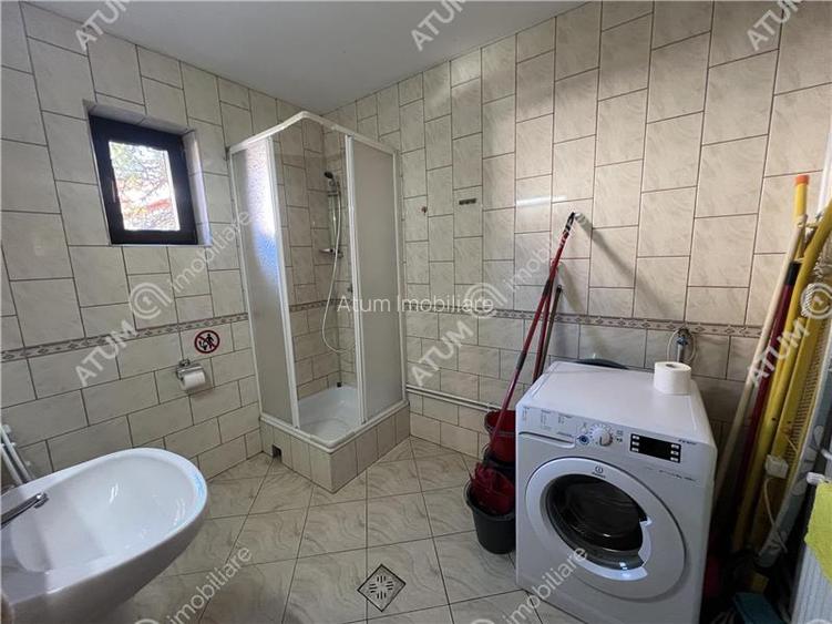 Pensiune de 7 camere cu 5 bai si teren de 377mp situata in Paltinis - 10