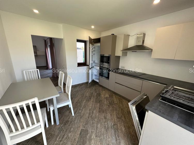 CASA SPATIOASA  CU GARAJ SI TEREN DE 600 MP - 4