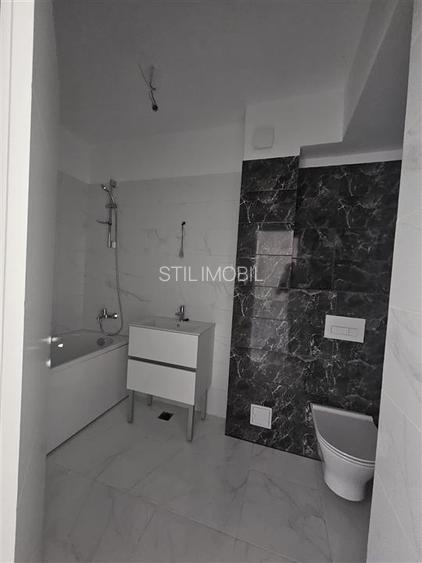 Apartament 2 camere - decomandat - 60mp - parcare inclusa. - 13