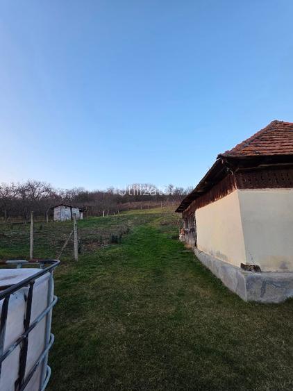 CASĂ CU TEREN  DE VÂNZARE ÎNTRO ZONĂ FRUMOASĂ SI LINISTITĂ - 12