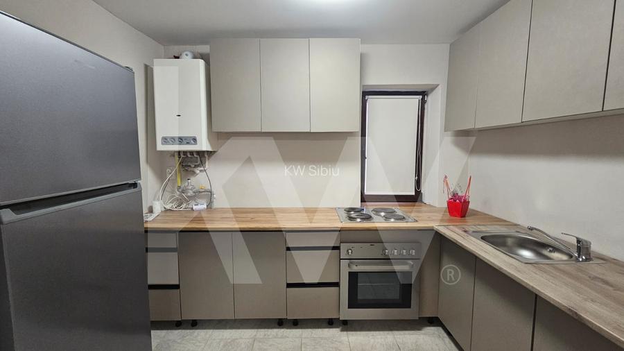 Apartament la casa de inchiriat 3 camere Cisnadie - 2